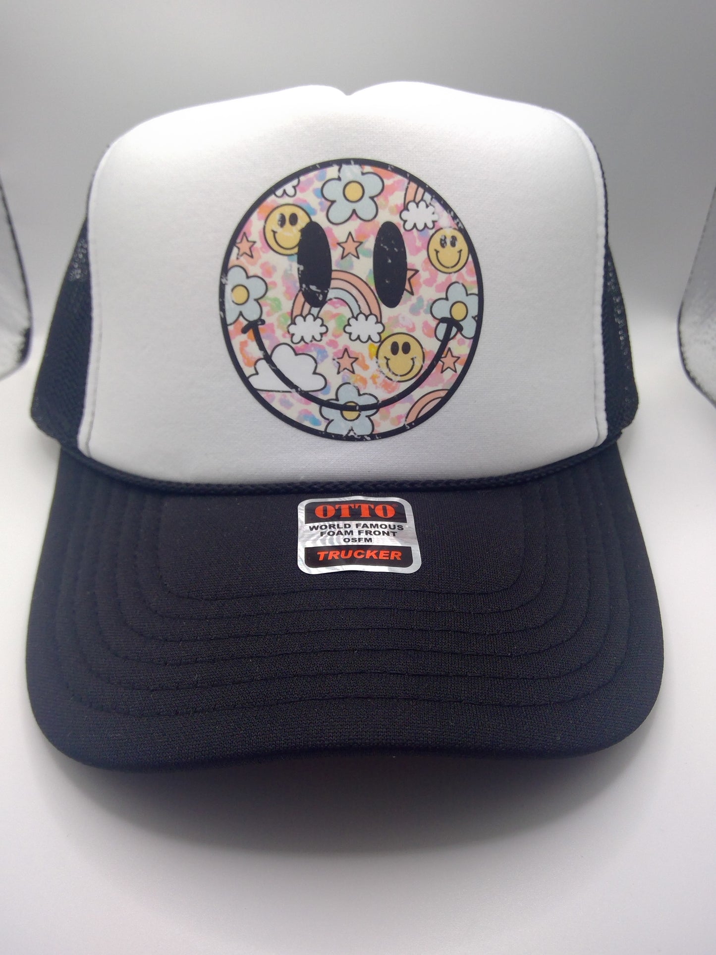 Retro smiley face black trucker hat