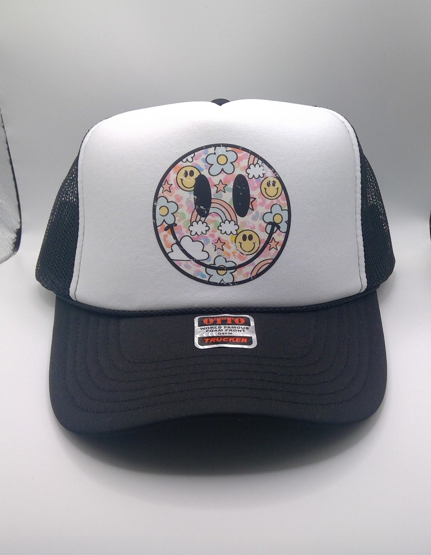 Retro smiley face black trucker hat