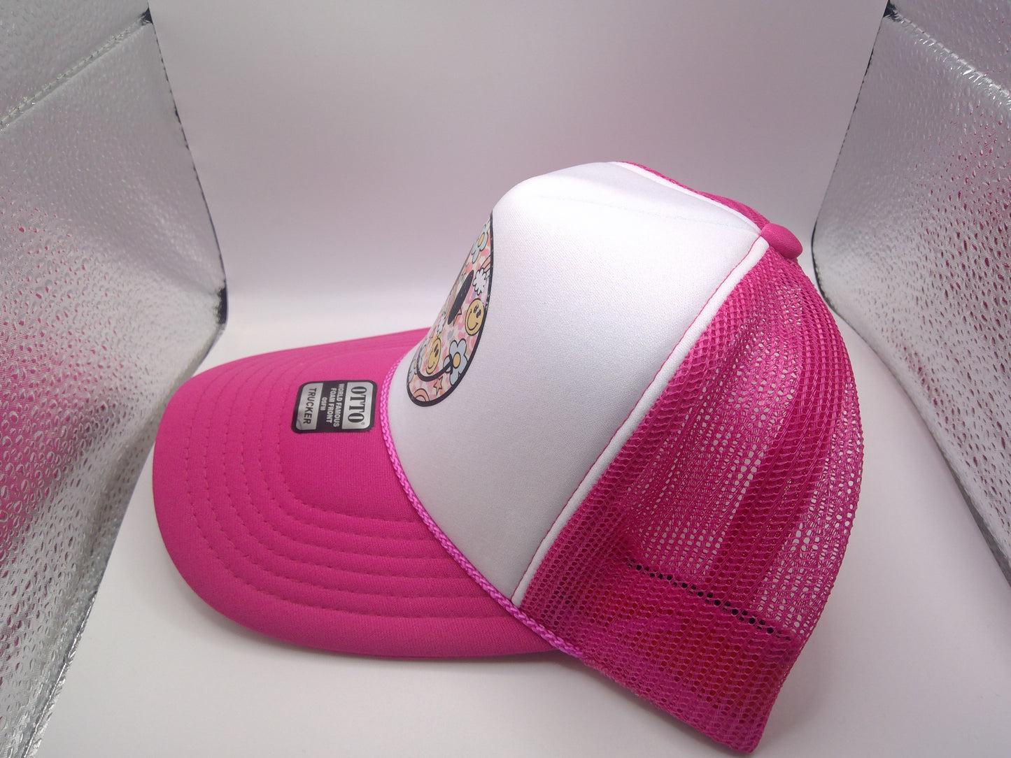 Rainbow Smiley Face Trucker Hat Pink