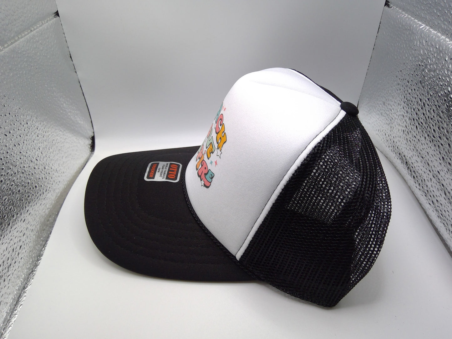 Teach Love Inspire Trucker Hat